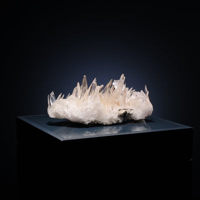 Clear Quartz with Iron Oxide Coating Natural Cluster from the Santander Province, Colombia mounted on a bespoke stand | Venusrox